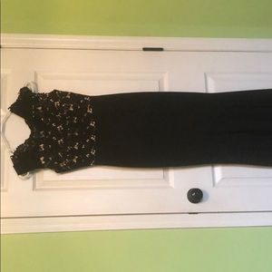 Floor length slight mermaid style black gown